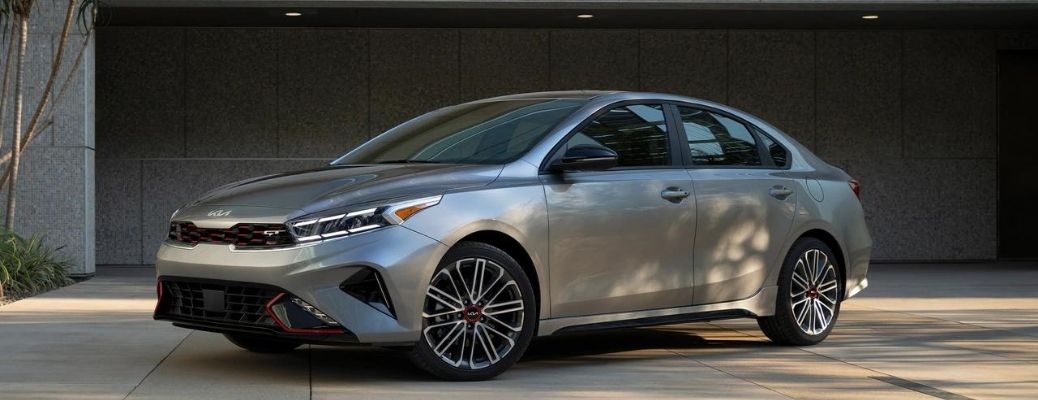 2022 Kia Forte Gray parked outside a building